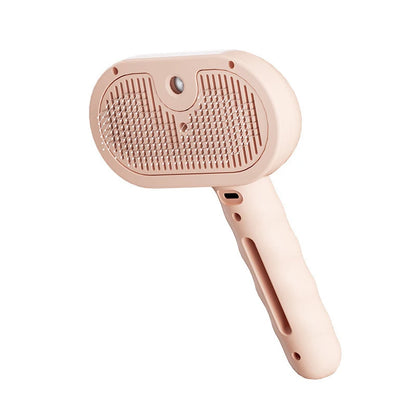 Brosse slicker anti-poils rose pour chien et chat, picots inoxydables et poignée ergonomique.