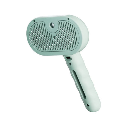 Brosse slicker anti-poils verte pour chien et chat, picots inoxydables et poignée ergonomique.